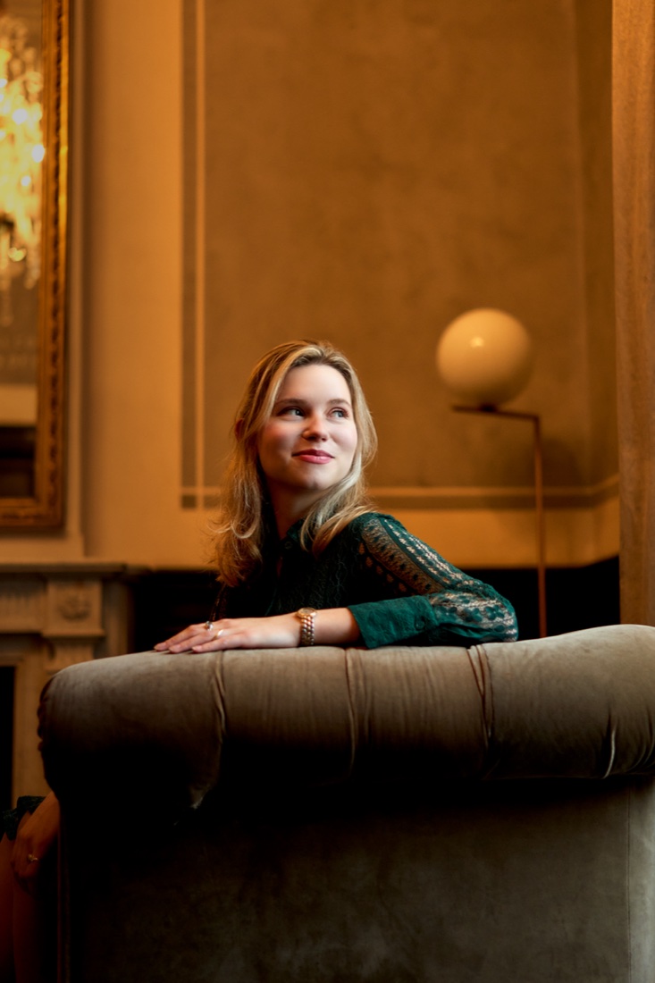 Candid moment, leaning on a sofa back